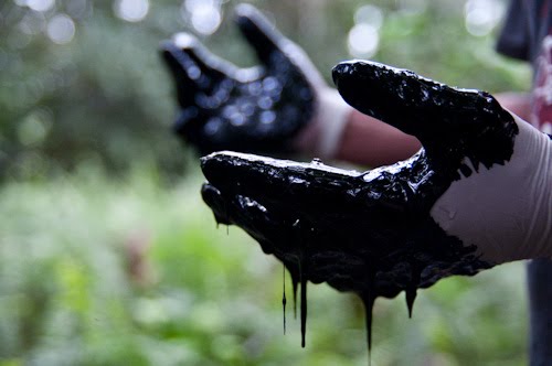 Chevron oil hands